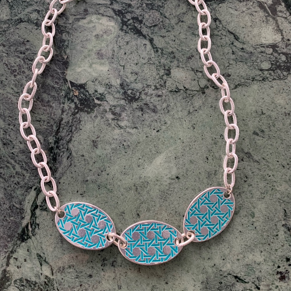 2 in 1 (reversible) genuine Foxy necklace blue and black. NWT.